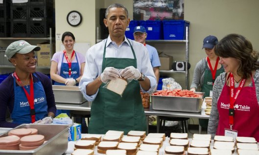 Obama making sandwiches